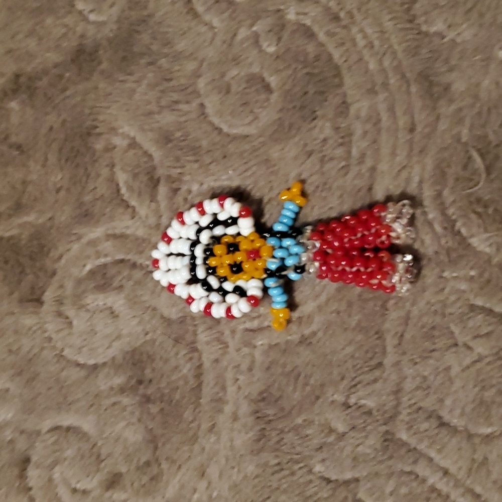 Beaded native American figure